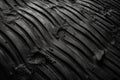 Top view of tire texture tracks on black ground