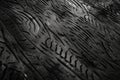 Top view of tire texture tracks on black ground