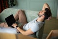 Top view of tired man with laptop