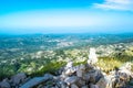Cetinje city top landscape from viewpoint  Njegos mausoleum. Lovcen National Park. Montenegro. Summer blue montanian view Royalty Free Stock Photo