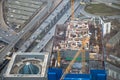 Top view to construction site of erecting skyscraper,futured office-tower.Part of big industrial project