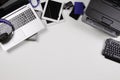 Top view to old laptop computers, digital tablets, mobile smart phones, printer, many used electronic gadgets devices on Royalty Free Stock Photo