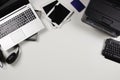 Top view to old laptop computers, digital tablets, mobile phones, printer, many used electronic gadgets devices on white Royalty Free Stock Photo