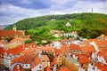 Top view to red tile roofs of Prague city Czech republic. Typical Prague houses. Petrshin hill and tower Royalty Free Stock Photo