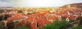 Top view to red tile roofs of Prague city Czech republic. Typical Prague houses. Petrshin hill and tower. Wide angle panorama Royalty Free Stock Photo