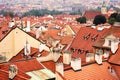 Top view to red tile roofs of Prague city Czech republic. Typical Prague houses Royalty Free Stock Photo