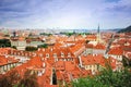 Top view to red tile roofs of Prague city Czech republic. Typical Prague houses. Wide angle panorama Royalty Free Stock Photo