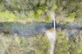 Top view to river crosses trail path in swamp landscape Royalty Free Stock Photo