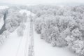 Top view to wood from bird`s eye. Amazing winter scene. Christmas theme. Winter background Royalty Free Stock Photo