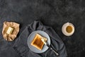 Top view of toast, butter and cup of coffee for breakfast Royalty Free Stock Photo