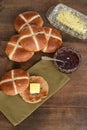 Top view toasted hot cross bun with butter