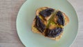 Top view of toasted multi grain bread with smashed avocado and pan broiled portobello mushrooms Royalty Free Stock Photo