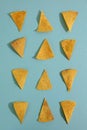 Top View Tortilla Nachos Mexican Corn Chips on Mint Background. Delicious Nachos Snack Royalty Free Stock Photo