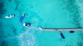 Top view of tourist speed boat approaching to floating port in p