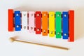 Top view of toy colorful xylophone, on the white table. Royalty Free Stock Photo