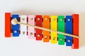 Top view, toy colorful xylophone, on the white table. Royalty Free Stock Photo