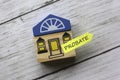 Top view of toy wooden house and sticky note written with Probate on white wooden background Royalty Free Stock Photo