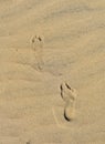 Top view of the traces of man on the sand Royalty Free Stock Photo