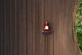 Top view of tractor planting corn seed in field Royalty Free Stock Photo