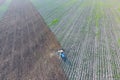 Top view of the tractor that plows the field. disking the soil. Soil cultivation after Royalty Free Stock Photo
