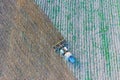 Top view of the tractor that plows the field. disking the soil. Soil cultivation after Royalty Free Stock Photo