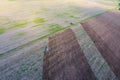Top view of the tractor that plows the field. disking the soil. Soil cultivation after Royalty Free Stock Photo