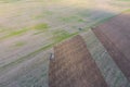 Top view of the tractor that plows the field. disking the soil. Soil cultivation after Royalty Free Stock Photo