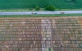 Top view of tractors driving beside test plots in field Royalty Free Stock Photo