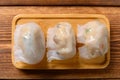 Top view traditional Cantonese style dumplings on a wood table