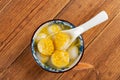 Traditional Chinese sweet dumplings with some chrysanthemum Royalty Free Stock Photo