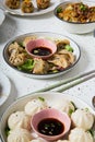 Top view of the traditional delicious Asian food dishes served on the table Royalty Free Stock Photo