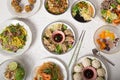 Top view of the traditional delicious Asian food dishes served on the table Royalty Free Stock Photo