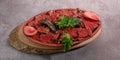 Traditional Turkish Doner Kebab also known iskender. Iskender kebab iskender kebap. Turkish style doner kebab food on wooden tray Royalty Free Stock Photo