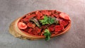 Traditional Turkish Doner Kebab also known iskender. Iskender kebab iskender kebap. Turkish style doner kebab food on wooden tray Royalty Free Stock Photo