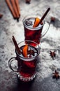 Top view of Traditional winter mulled wine in vintage glass on metallic background, selective focus and toned image. Sangria