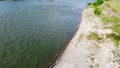 Top view train of anglers fishing on concrete bank spillway of Denison Dam when water is generating releasing Royalty Free Stock Photo