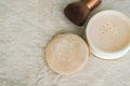 Top view of translucent powder with brush and puff to make up for beauty Royalty Free Stock Photo