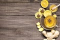 Top view of transparent cup of ginger tea with lemon, spices and Royalty Free Stock Photo