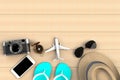 Top view of Traveler`s accessories on wooden table background, Essential vacation items, Travel concept