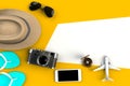Top view of Traveler`s accessories on yellow table background, Essential vacation items, Travel concept
