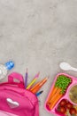 top view of tray with kids lunch for school, bag with pencils Royalty Free Stock Photo