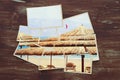 top view of tropical photo collage on wooden background