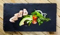 Top view of tuna tataki with avocado and greens Royalty Free Stock Photo