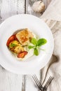 Top view turkey cutlets and grilled vegetables. Delicious and healthy homemade food. Cheese sauce with garlic and olive oil Royalty Free Stock Photo