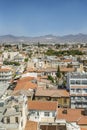 Top view of the Turkish part of Nicosia. Traditional architecture and mosques with minarets against the backdrop of mountains with Royalty Free Stock Photo