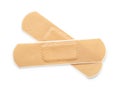 Top view of two beige adhesive bandages Royalty Free Stock Photo