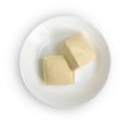 Top view of two blocks of white tofu with plate isolated on white Royalty Free Stock Photo