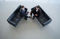 Top view of a two businessman shaking hands - Welcome to business. Royalty Free Stock Photo