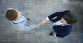 Top view of a two businessman shaking hands. Welcome to business. Royalty Free Stock Photo