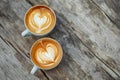 Two Cups of Cappuccino with Heart Latte Art, Coffee Lovers Concept Royalty Free Stock Photo